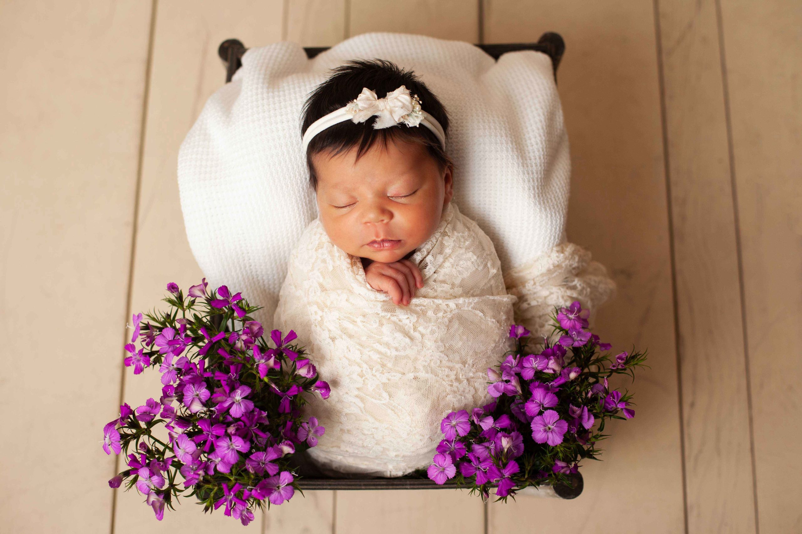 When considering a newborn photographer think of safety, style, and cost