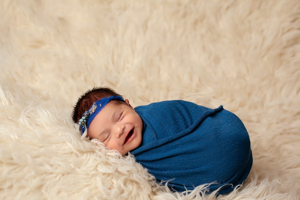 Starting a newborn photography business can be scary. But if you follow my top 7 tips, you'll have success in no time!