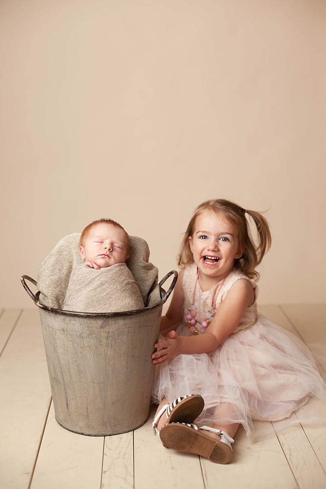 Including siblings in a newborn photo sessions helps create a safe, loving space for older children. It reminds them that they are still appreciated, loved, and adored.