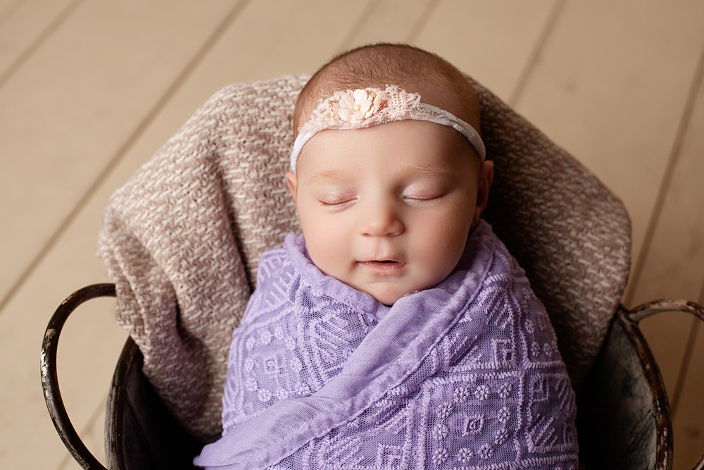 Starting a newborn photography business is not for the faint of heart. Keep reading to find out my top 7 things to consider prior to taking the full-time business plunge!