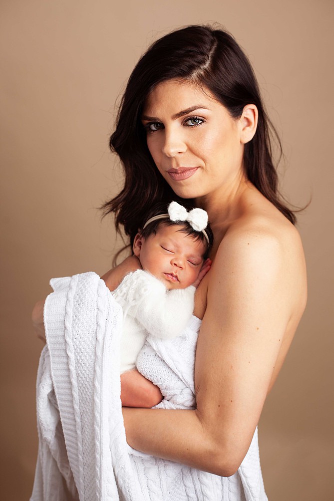 Mom and baby are a must-take pose when having your newborn session.