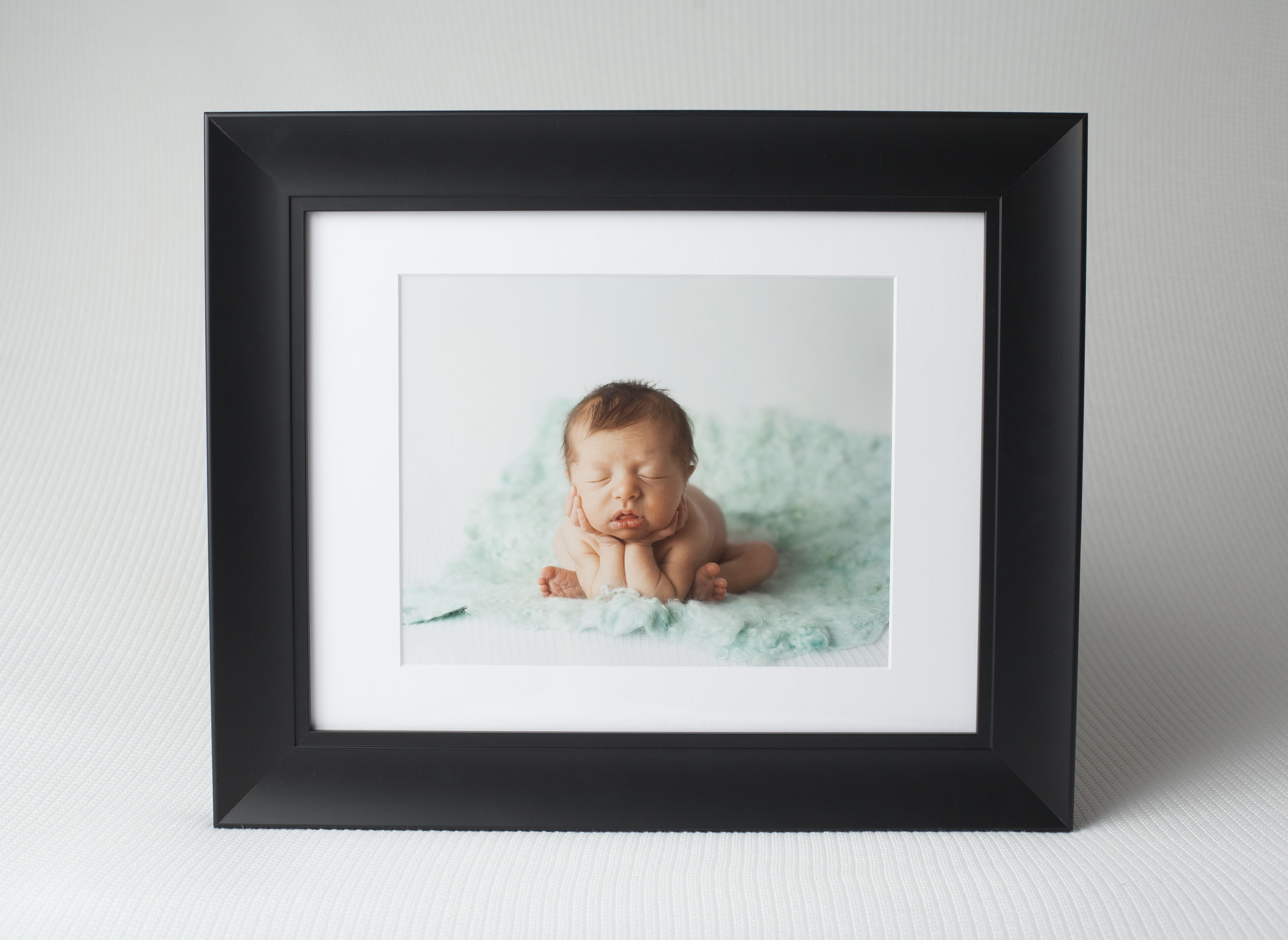 When you book with a professional photographer; you are investing in an experience. The experience ends when you order one-of-a-kind framed portraits that will look amazing in your home for years to come.