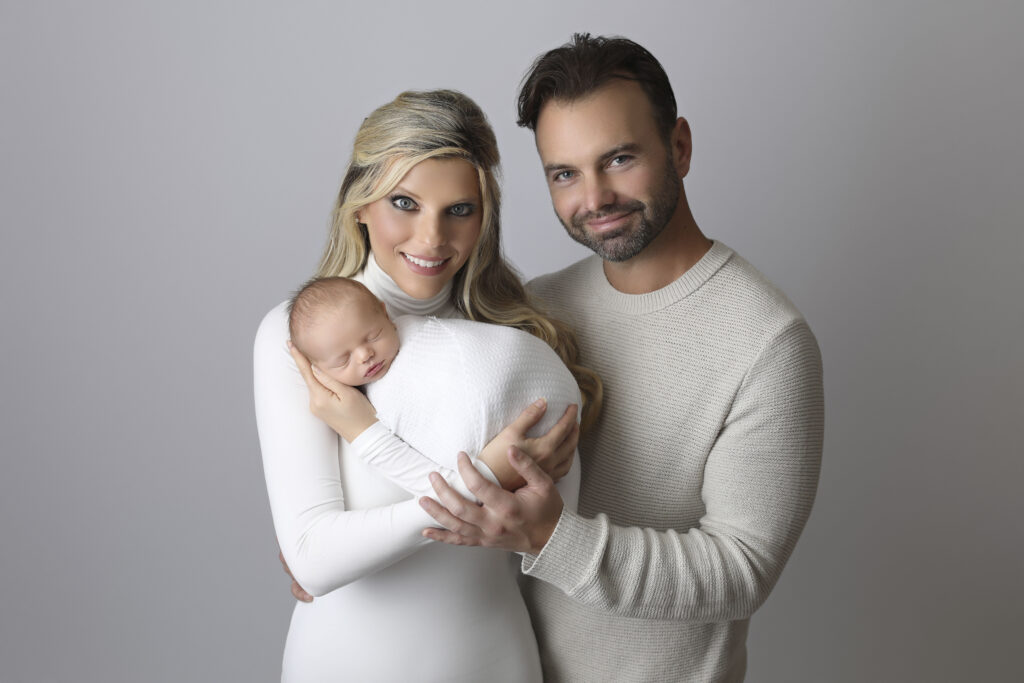 Newborn Boy in mom and dads arms