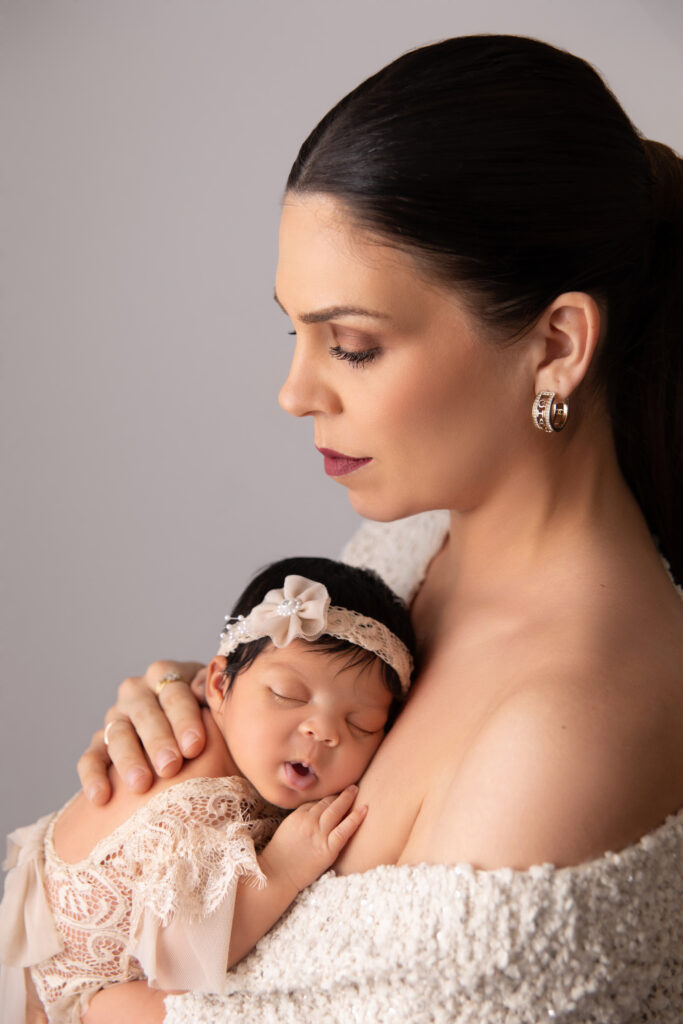 Newborn and mom photographed by a  Santa Ana Newborn Photographer