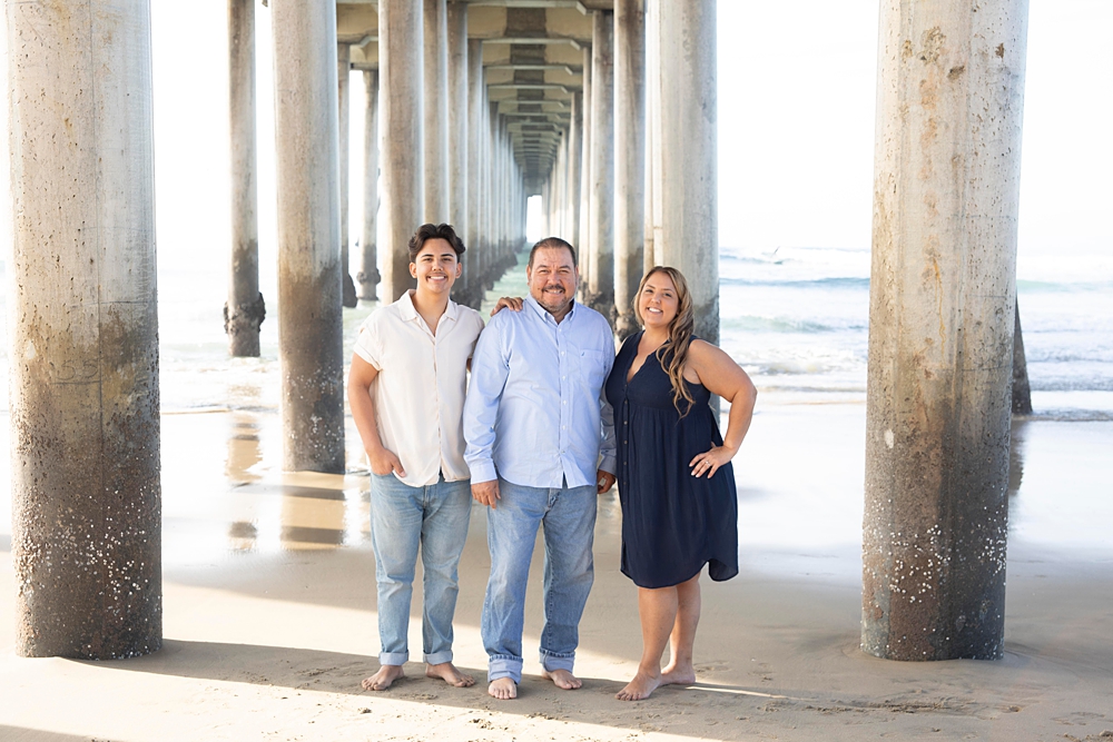 Family session from a Huntington Beach Family Photographer at a pier.