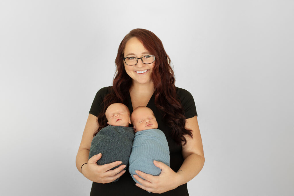 Twin mom during a Anaheim Newborn Photoshoot